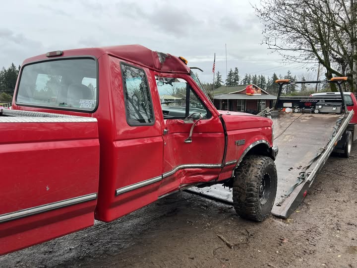 Damaged truck on Otto Kings flatbed